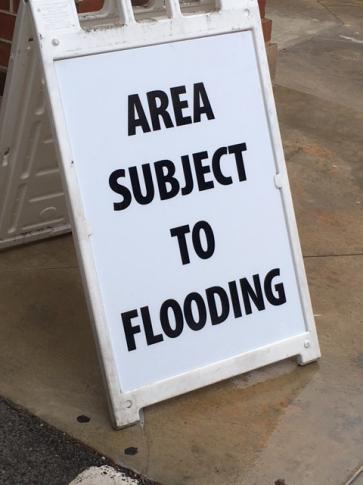 Signs warning shoppers of potential floods in the parking lot of the Crabtree Valley Mall began popping up Friday morning ahead of Hermine. 