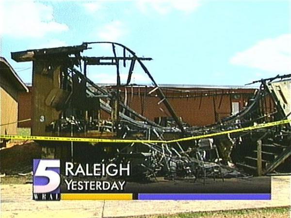 Smoke billows from a mobile classroom that was destroyed by fire. (WRAL-TV5)