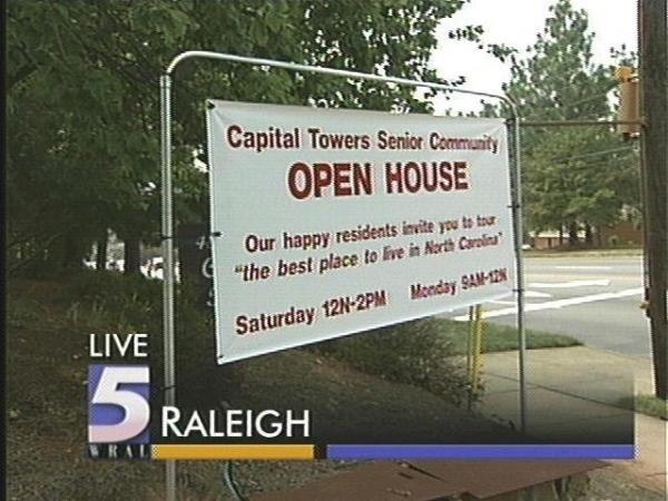 Residents demonstrated against living conditions on the day Capital Towers planned an open-house.