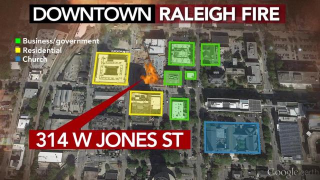 Officials said 10 buildings were damaged by a fire that destroyed an apartment building in downtown Raleigh.