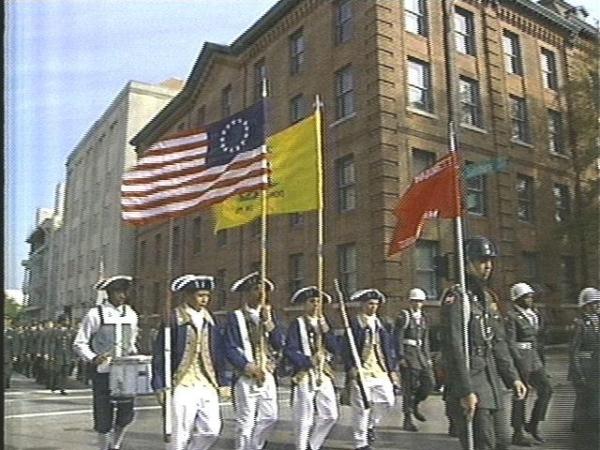 Marchers in Raleigh's Veterans Day parade