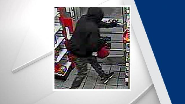Officers with the Fayetteville Police Department are searching for a suspect wanted in connection with an armed robbery Wednesday night at a gas station on Reilly Road. 