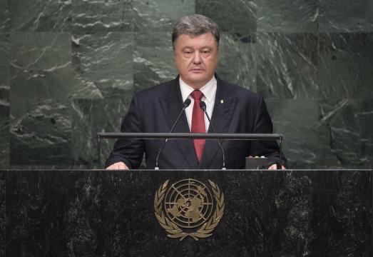 Ukrainian leader, a Russian adversary, gets low-key welcome