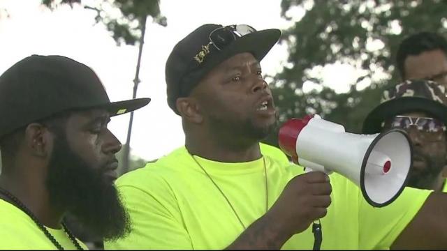 Residents rally to fight violence at McDougald Terrace 