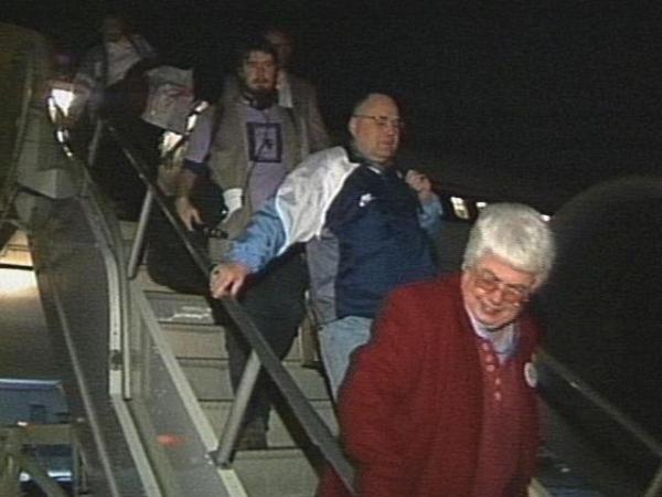 Happy fans arrive at RDU after enjoying UNC's win in the Gator Bowl.
