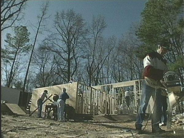 Volunteers are in a "blitz-build", erecting the 32nd Habitat for Humanity home in Durham.