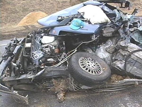 A woman was killed Tuesday when her car collided with a fuel tanker. This is all that's left of her blue Oldsmobile.