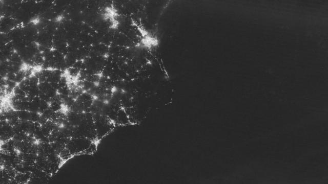 The power outage at Ocracoke and Hatteras islands could be seen from space in images taken by NASA. Here, in the image taken on July 27, the lights are still on. Photo via NASA
