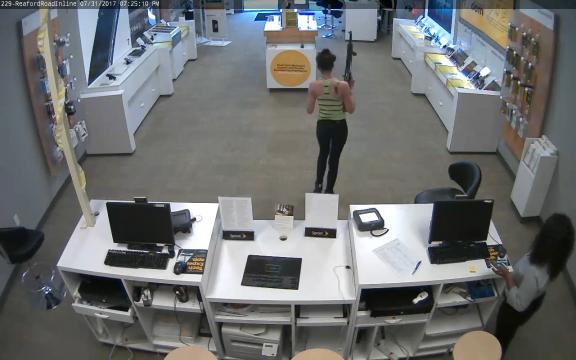 Police are searching for a woman who stole cell phones from a store in Fayetteville on Wednesday evening while carrying an assault-style rifle.