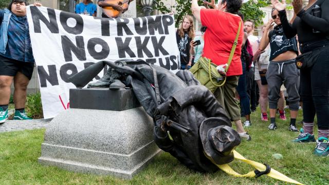 PHOTOS: Durham protesters topple Confederate monument