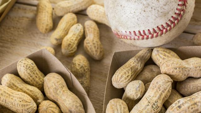The relationship between peanuts and baseball goes all the way back to when a peanut company bought ad space on the back of scorecards in 1898.