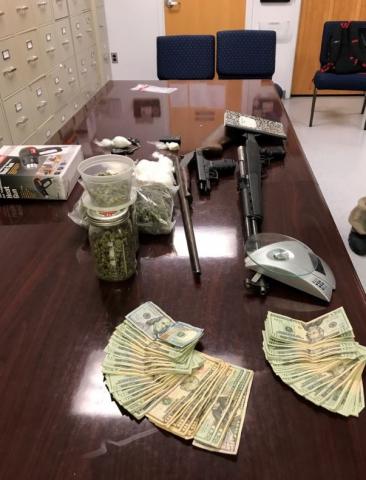 Authorities seized almost $100,000 worth of drugs, guns and vehicles from a Bunn man after executing a search warrant on Tuesday at his home.