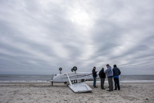 Plane Lands on Long Island Beach, Then Flips