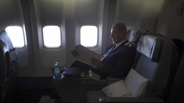 FILE-- Israeli Prime Minister Benjamin Netanyahu while flying to Uganda to commemorate the 40-year anniversary of the Entebbe raid, July 4, 2016. The Israeli police were poised to recommend on Feb. 13, 2018, that Netanyahu be charged with corruption, casting a dark pall over the future of a tenacious leader who has become almost synonymous with his country, according to the Israeli media. (Uriel Sinai/The New York Times)