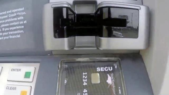 Pair charged with putting skimmers on ATMs