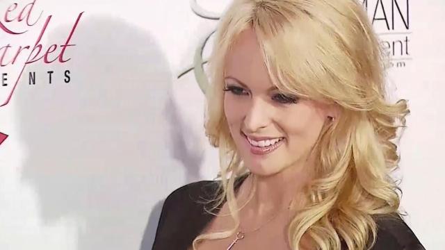 Porn actress files lawsuit against Trump lawyer as president stays silent