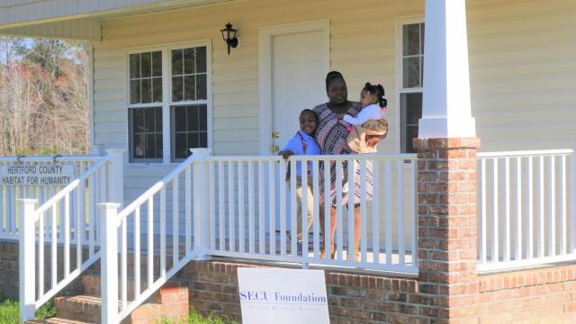 Shavonda Smith and her children Jayden, 9, and Mia, 3, welcomed about 30 well-wishers to their new home in Ahoskie on Sunday, March 18, 2018.