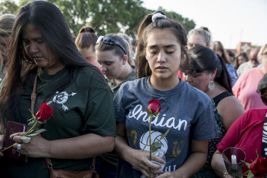 A vigil for victims of a school shooting that left 10 dead in Santa Fe, Texas, May 18, 2018. A 17-year-old student armed with a shotgun and a .38 revolver opened fire on his fellow students at Santa Fe High School, before surrendering himself, authorities said. (Ilana Panich-Linsman/The New York Times)