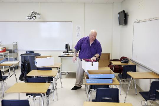 Social Studies teacher Mark Jones packs up his room as he prepares to leave the building for good, after it was determined the middle school would consolidate with the high school in Martin County, N.C., June 18, 2018. Martin County does not have enough students to keep both schools open. Deaths now outnumber births among white people in more than half the states in the country, including North Carolina. (Travis Dove/The New York Times)