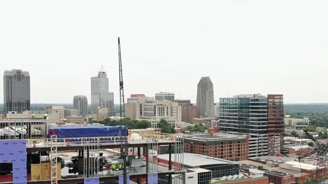 Business owners in downtown Raleigh watch as construction booms