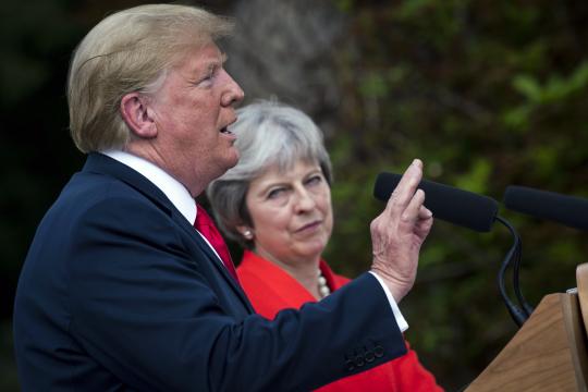 Trump, on best behavior, heaps praise on May as 'tough' and 'capable'