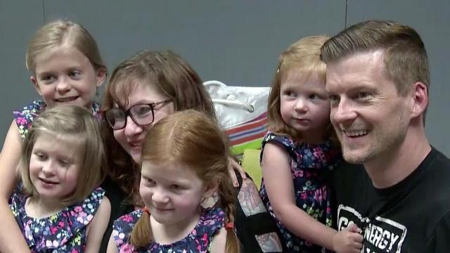 3 MI sisters hear with newly activated cochlear implants