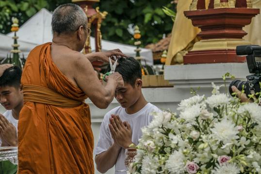 Thai Boys Become Monks as Rescuer’s Widow Looks On