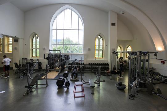**EMBARGO: No electronic distribution, Web posting or street sales before Monday 3:00 a.m. ET July 30, 2018. No exceptions for any reasons. EMBARGO set by source.** The gym at at Le Saint Jude, a gym and spa, located in a former church in Montreal, Quebec, Canada, June 5, 2018. Dozens of churches in Quebec have been repurposed into reading rooms, luxury condos, cheese emporiums and upmarket fitness centers in a Canadian province where the Roman Catholic Church is in decline. (Christinne Muschi/The New York Times)