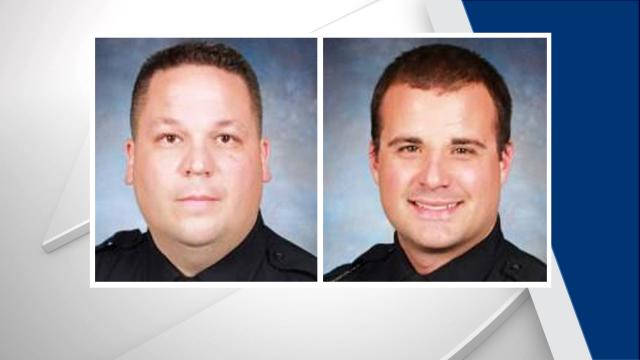 Durham police Cpl. B.M. Glover, left, and Officer G.F. Paschall