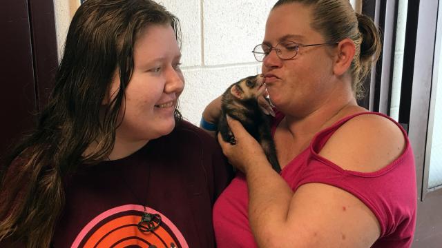 Miranda Clum (left) and her mother Cynthia Thomas adopted a ferret from the CUmberland County Animal Shelter, Aug. 18, 2018, during the Clear the Shelters event. The mother and daughter duo were thinking of naming their new pet Bandit.