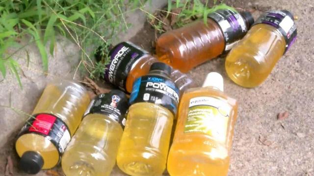 Woman finds bottles of urine in her front yard