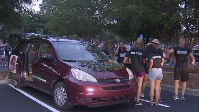 High school seniors host parking lot parade