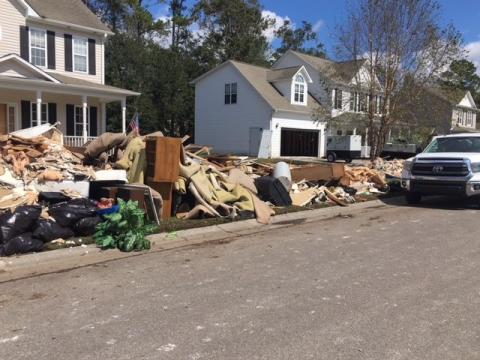 People in one Leland community were cleaning up on Sept. 26, 2018, nearly two weeks after Hurricane Florence slammed the North Carolina coast with days of heavy rain.  