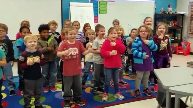 Kids sing (and sign) Happy Birthday to deaf janitor