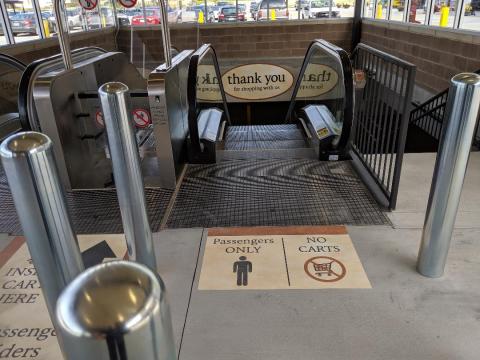 Wegmans escalator to lower parking deck