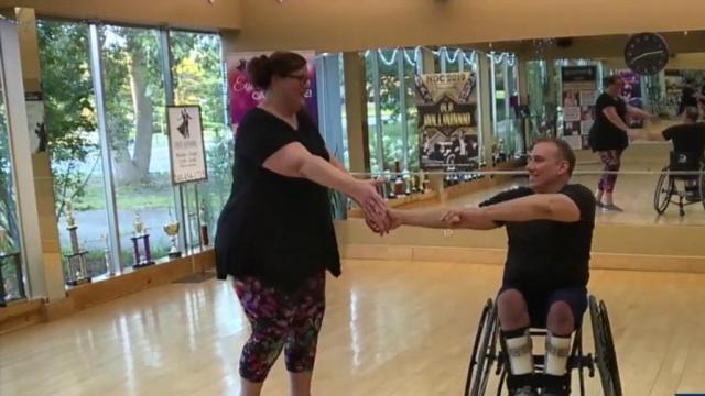 Dance Mobility helps man in wheelchair dance during wedding
