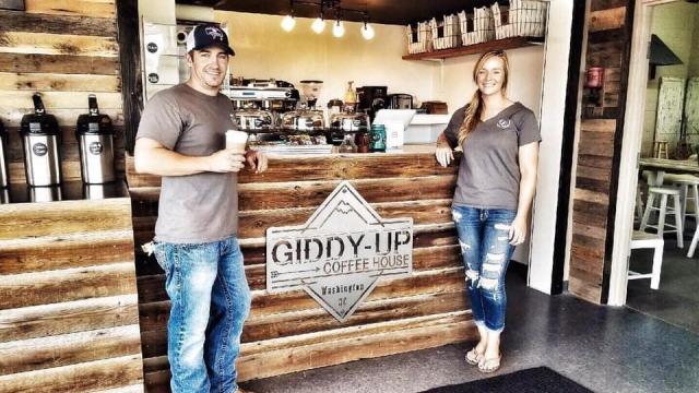 Loralyn Moore (right) and her husband, Trey (left), a native of Washington, N.C., renovated an old car garage into Giddy-Up Coffee House. (Photo Courtesy of Washington Tourism Development Authority)