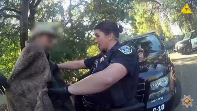 Body-cam video: Lizard jumps from man's coat during police search