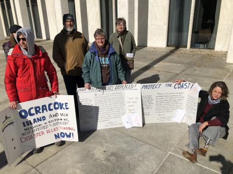People from Ocracoke visited the N.C. General Assembly Wednesday, Nov. 13, 2019, and called on lawmakers to approve disaster funding that will help their island recover from Hurricane Dorian. Some of their posters are letters from school children, whose school was destroyed.