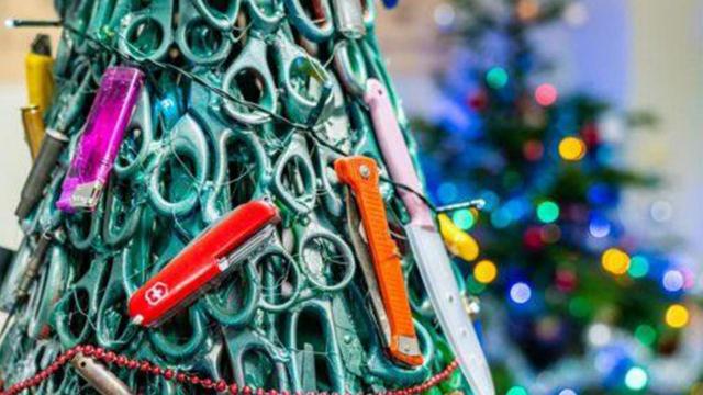 The staff at this airport made a Christmas tree out of confiscated items