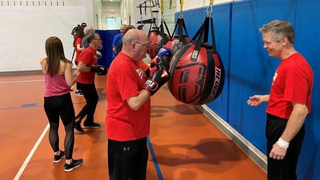 Former boxing champion motivated by boxing participants with Parkinson's disease 