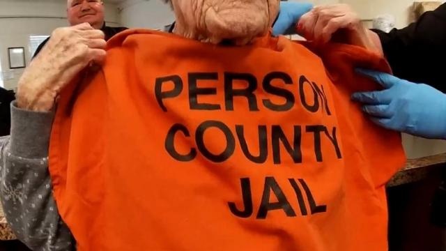 For her 100th birthday she got an orange Person county jail shirt