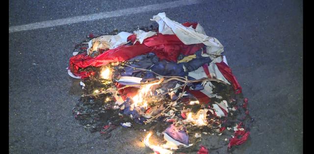 American flag burned during protests in downtown Raleigh