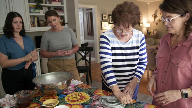 Sara Flores (third from left) teaches Vivian Howard an empanada recipe that has been in her Mexican-Jewish family for generations. Lauren Vied Allen (far left) and Saralynn Flores Vied (center) look on. Credit: Courtesy of Somewhere South.

