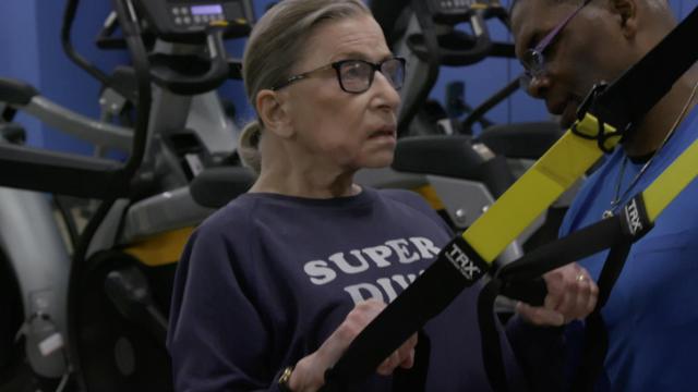 Justice Ruth Bader Ginsburg is continuing her workouts at the Supreme Court gym amid the coronavirus pandemic, according to her longtime personal trainer.