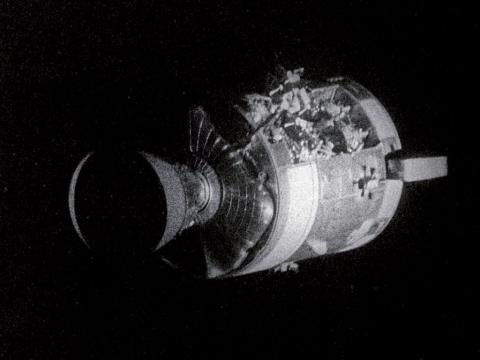 Odyssey's damaged service module, as seen from the lunar module Aquarius, hours before reentry (NASA)