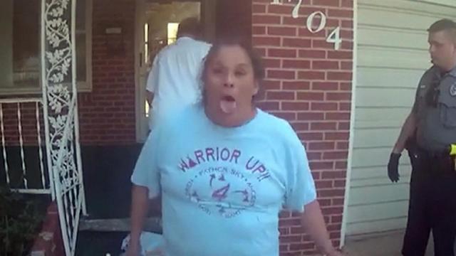 Caught on camera: Woman arrested after purposely coughing on officer 