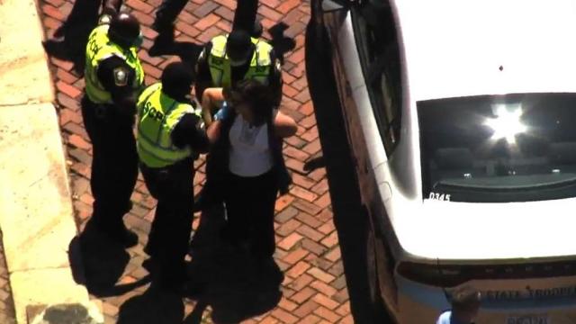 Ashley Smith, organizer of ReOpenNC arrested by Raleigh Police in downtown Raleigh. 