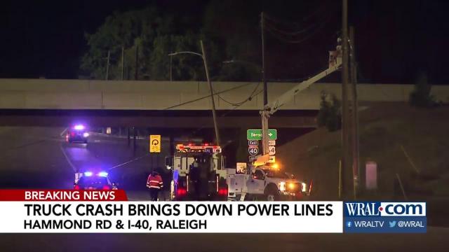 Truck rolls knocks down poles and traffic signals at Hammond Road, I-40 in Raleigh
