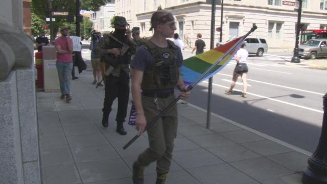 Armed demonstrators rally in downtown Raleigh during pandemic